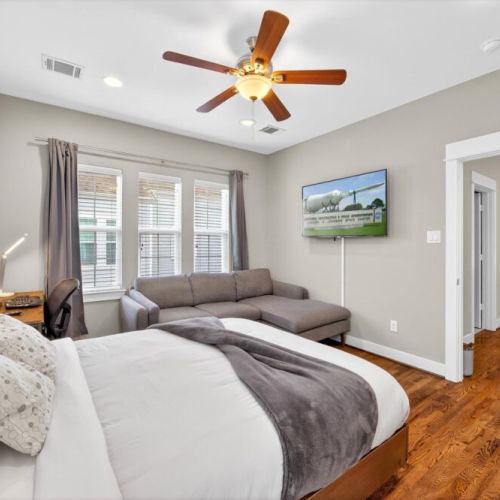 Smart TV and sectional sofa included for maximum comfort.