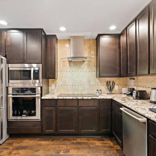 Fridge dispenses water and ice! Stainless steel appliances.