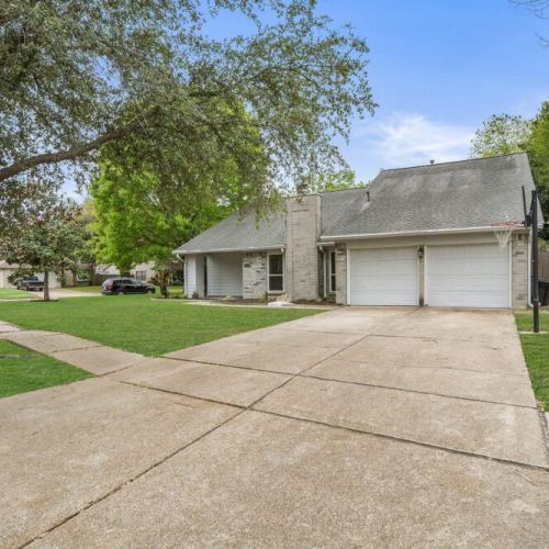 An exterior view of our lovely home. Can't wait to host you. Basketball hoop included!