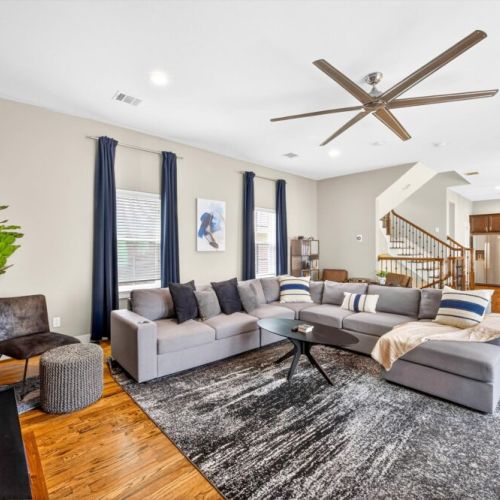 Step into comfort and style with our modern-designed living room.