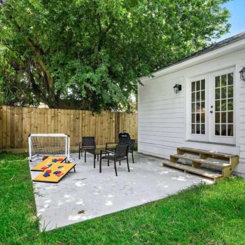 Grill, table/chairs for 6, lounge, soccer set, cornhole set, and football.