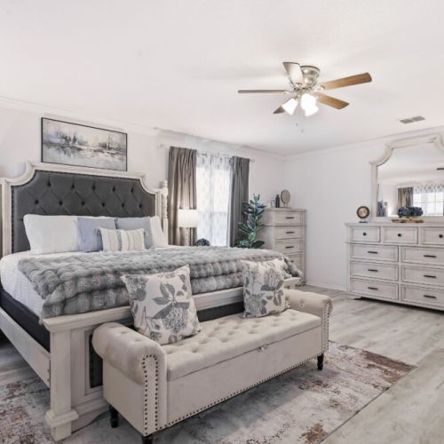 Primary bedroom with a king size bed!