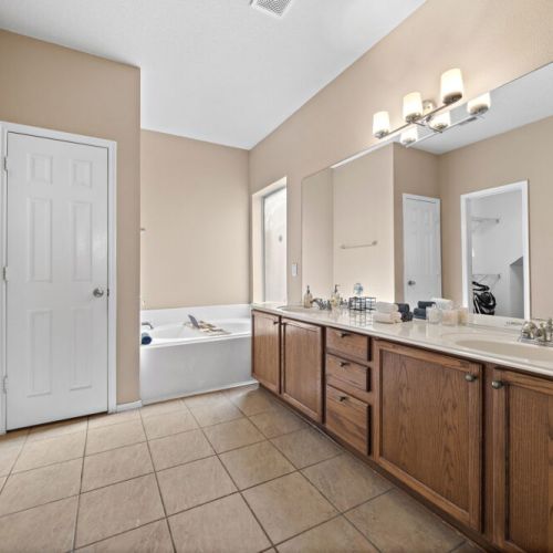 Primary bathroom is fully stocked with all you need. Makeup pads and q-tips included.