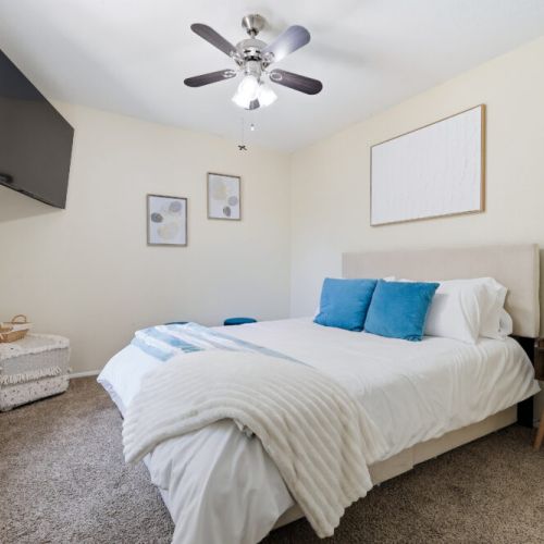 4th bedroom with queen size bed and twin size bed (daybed with trundle), and a seating area with poufs and ottomans for your comfort!