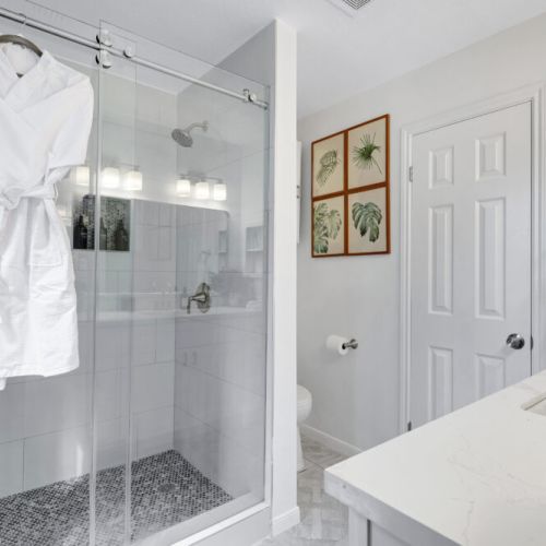 White robes and towels included.