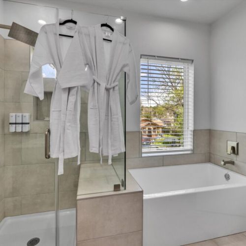 Pour yourself a glass of wine, sit back & relax! White robes included.