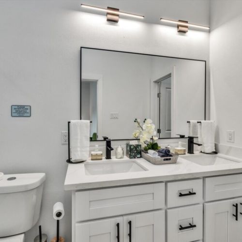Primary bathroom is fully stocked with all you need. Makeup pads and q-tips included.