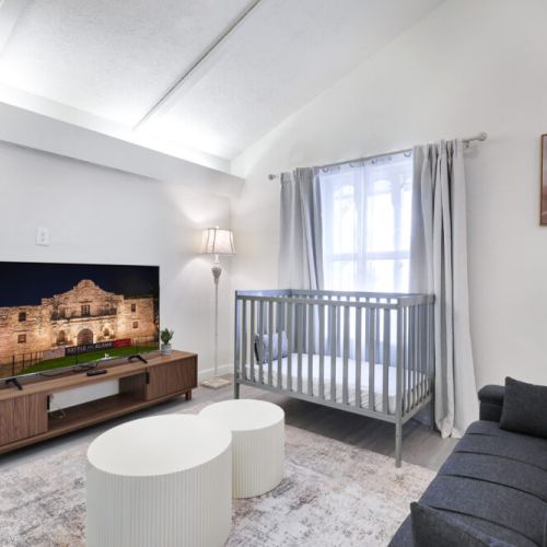Large smart TV, twin sized futon and crib included for your family convenience.