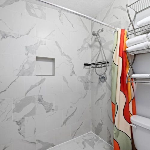 Primary bathroom is fully stocked with all you need. Makeup pads and q-tips included.