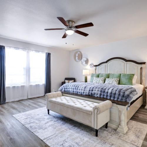 Primary bedroom with king size bed.