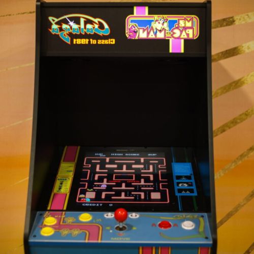 Bring out your competitive side with the arcade machine, perfect for some nostalgic fun.