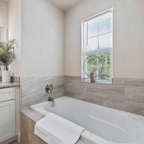 Pour yourself a glass of wine, sit back & relax! White robes included.