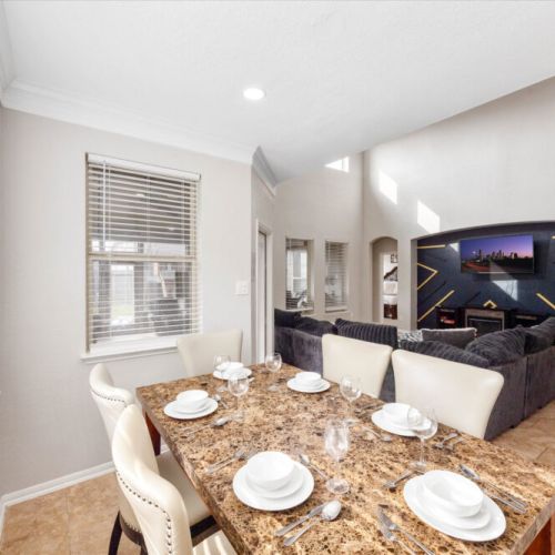 Charming 2nd dining area that sits 6, adjacent to kitchen and living room.