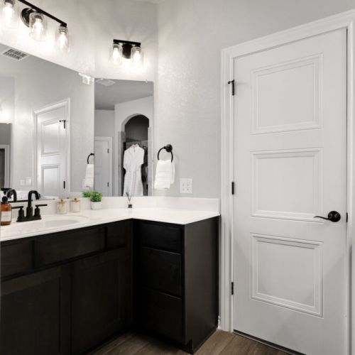 Primary bathroom is fully stocked with all you need. Makeup pads and q-tips included.