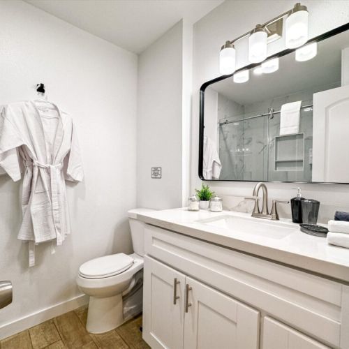Bathroom is fully stocked with all you need. Makeup pads, q-tips and white robes included.