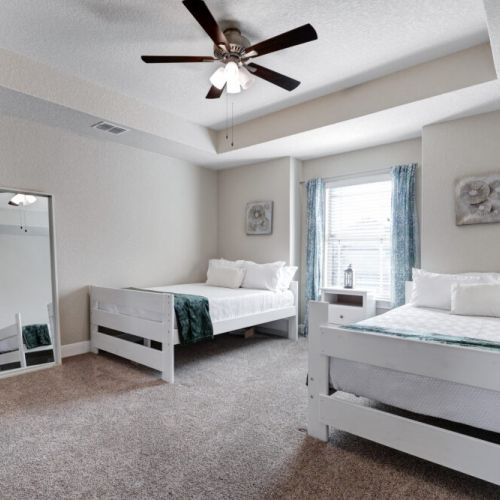 5th bedroom with two queen sized beds.