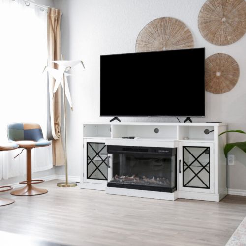 Cozy up by the electric fireplace.