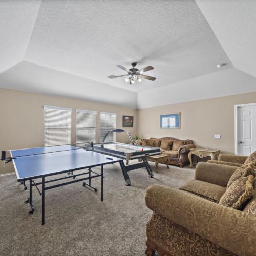 Game room with air hockey and ping pong