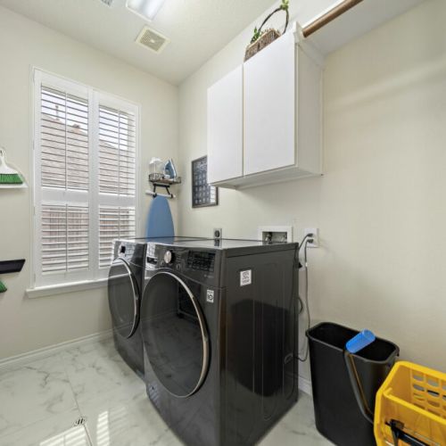 Fully-equipped laundry room.