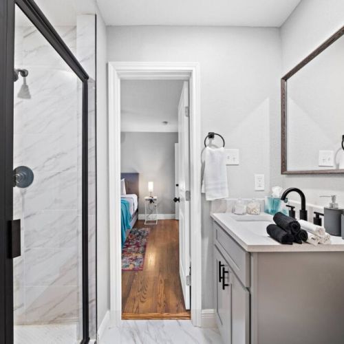Primary bathroom  is fully stocked with all you need. Makeup pads and q-tips included.