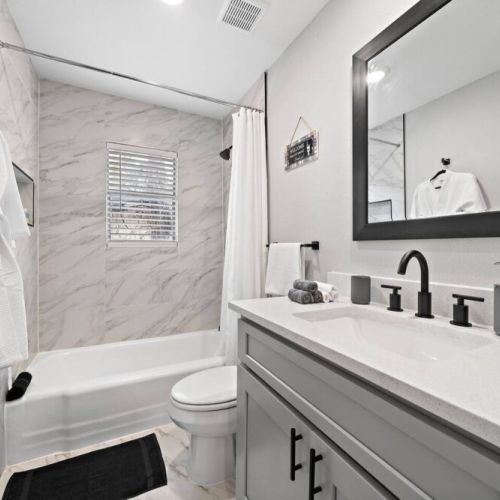 Bathroom is fully stocked with all you need. Makeup pads, q-tips, and white robes included.
