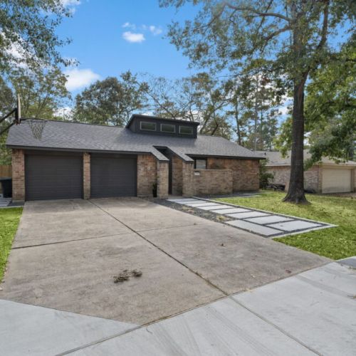 An exterior view of our lovely home. Can't wait to host you. Also, basketball hoop and basketball included!
