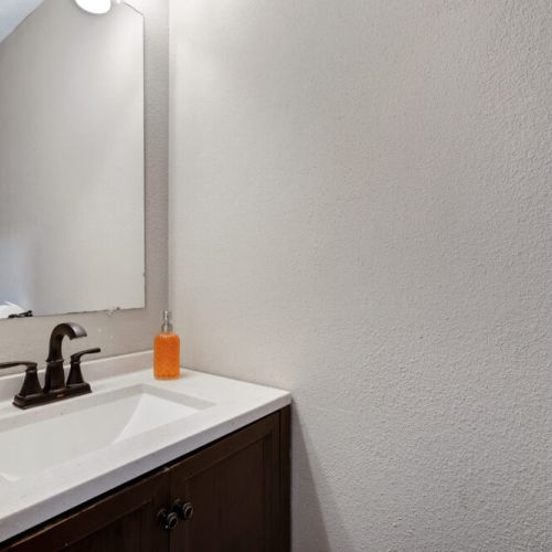 Half bath next to the game room for maximum convenience.