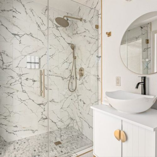 Modern walk-in shower designed for everyday comfort. Towels included.