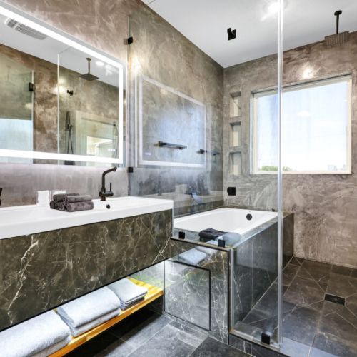 Primary bathroom is fully stocked with all you need. Makeup pads and q-tips included.