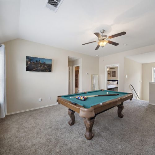 Full-size pool table also included.