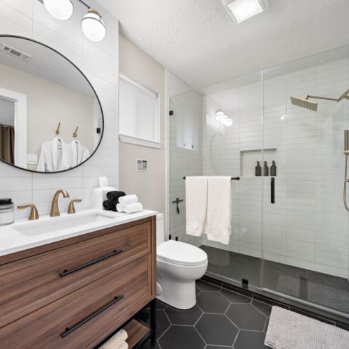 Primary bathroom is fully stocked with all you need. Makeup pads and q-tips included.