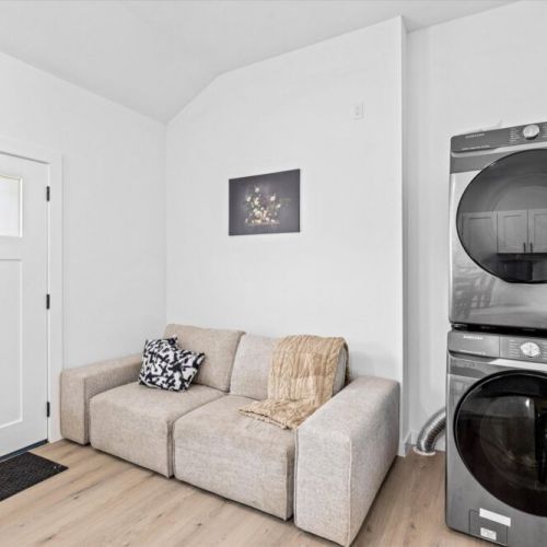 Fully-equipped laundry area.