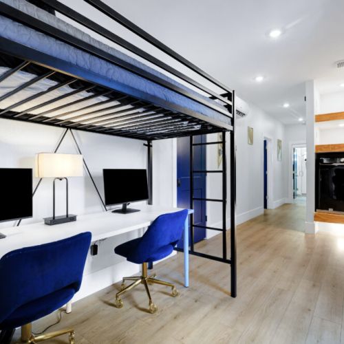 Do you need to finish some work? No problem, we got you covered! We include a large desk with 2 monitors and desk chairs.