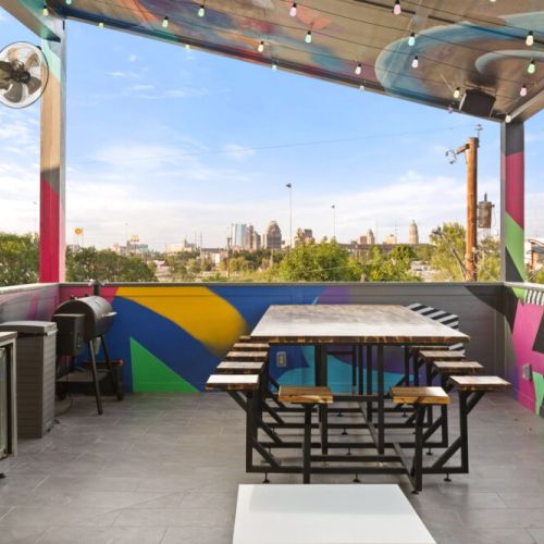 Gather around, share a meal, and let the city lights set the mood