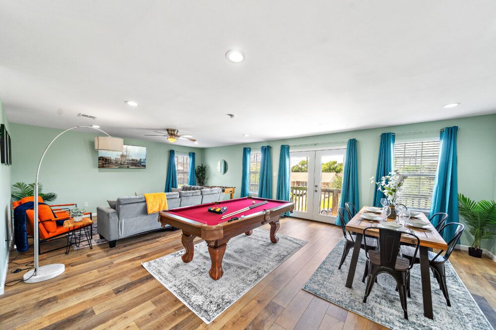 Full-size pool table and foosball table included.