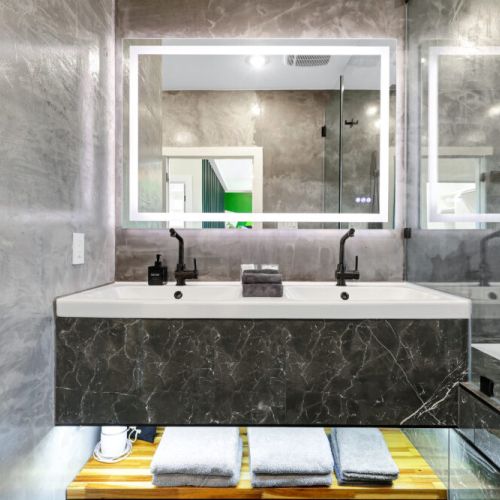 Primary bathroom with an amazing walk in tub/shower combo