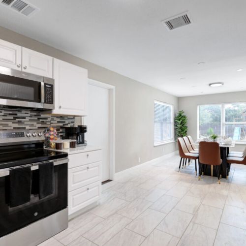 Dining area is conveniently close to the kitchen.