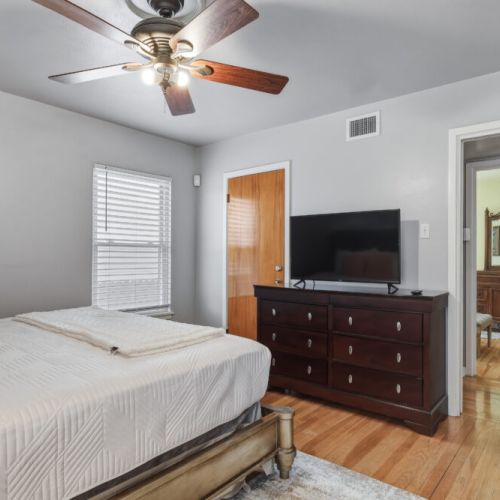 TV and full-length mirror included.