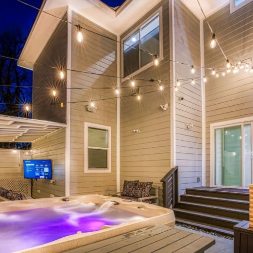 Play, relax, and soak in the colorful vibes of this inviting hot tub.