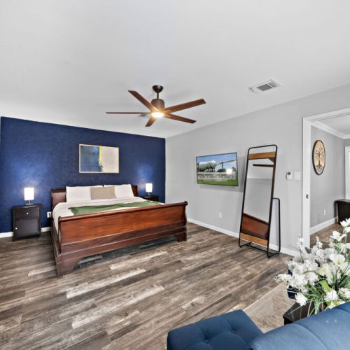 Primary bedroom with king size bed.