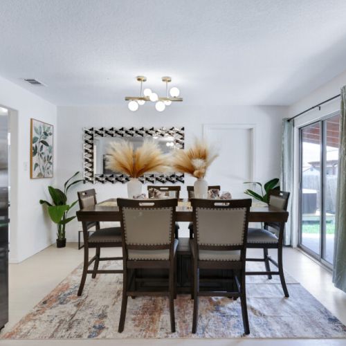 Spacious main dining table that sits 6 with full tableware and silverware included.