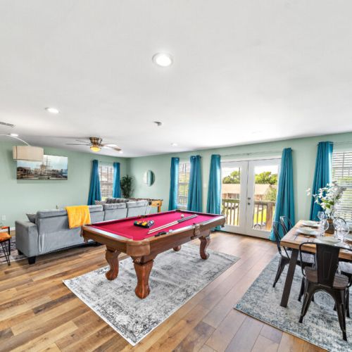 Full-size pool table and foosball table included.