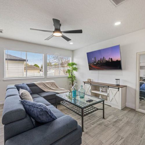 Large smart TV and full-length mirror  included.