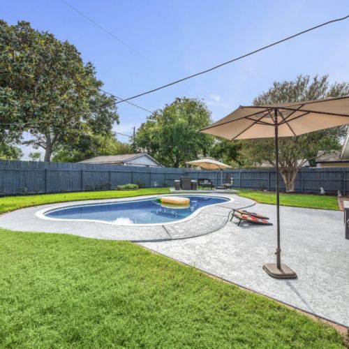 Grill, cornhole set, and outdoor freezer included