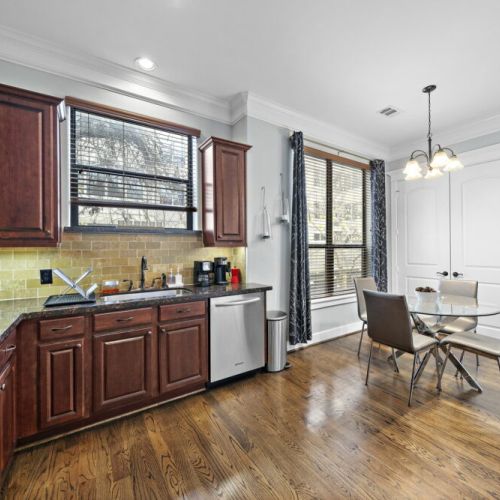 Fully equipped kitchen with high quality granite countertops.