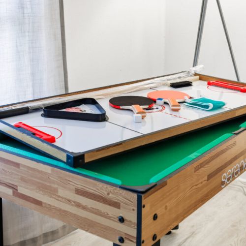 Challenge your friends to a foosball, pool, air hockey, or ping pong tournament with the multi game table!