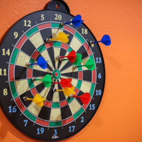 Test your aim with a fun game of darts in the game room.