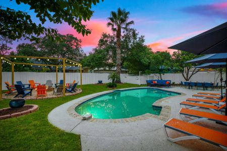 Unwind by the sparkling pool or soak in the hot tub while enjoying a beautiful sunset.