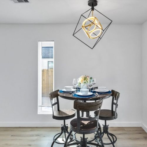 Dining area with direct view to the backyard.