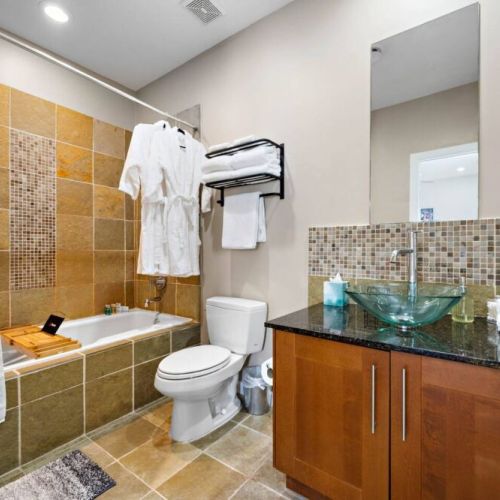 Pour yourself a glass of wine, sit back & relax! White robes included.